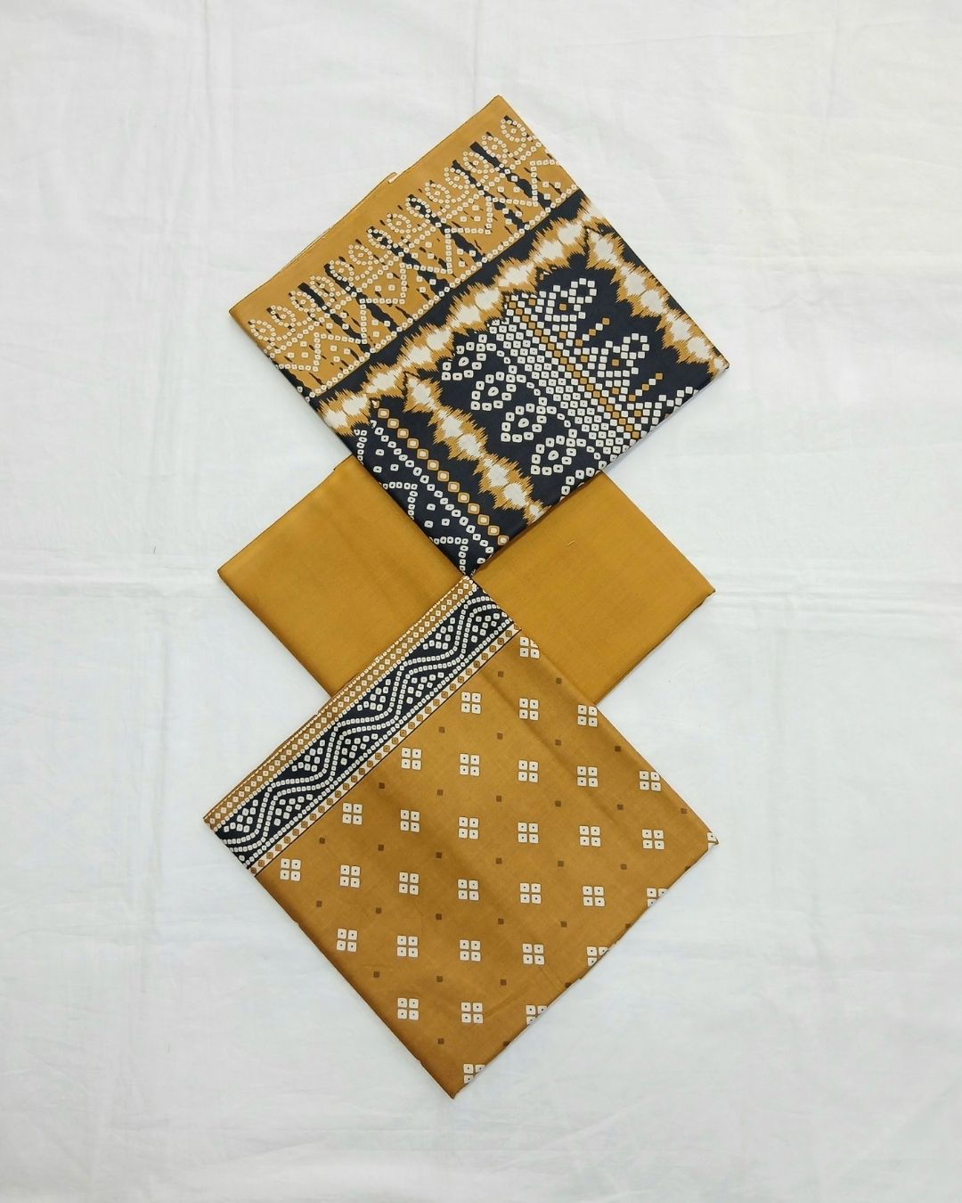 Mustard yellow printed cotton 3pc suit with black dupatta by Ajwa Textiles