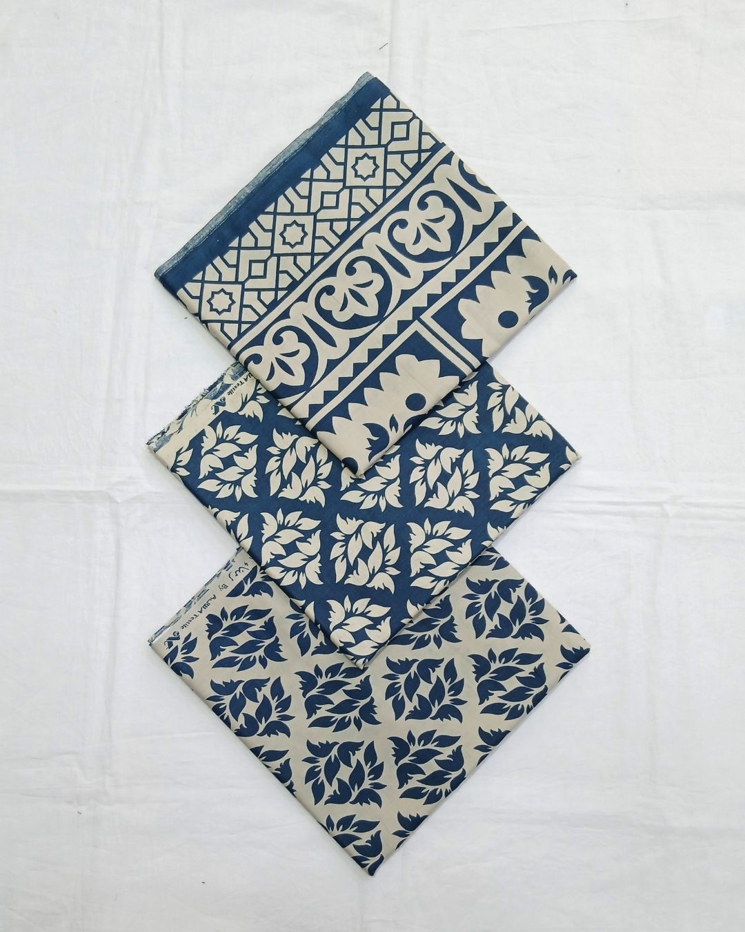 Cream and teal leaf printed cotton 3pc suit by Ajwa Textiles