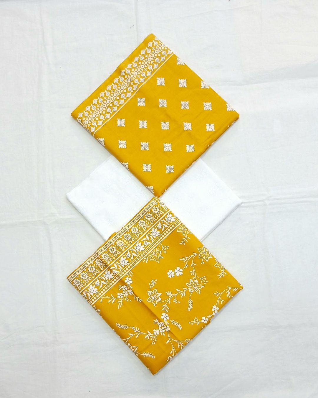 Yellow floral geometric cotton 3pc suit by Ajwa Textiles